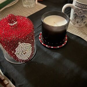 Elegant Red Beaded Candle Holder with Black Candle